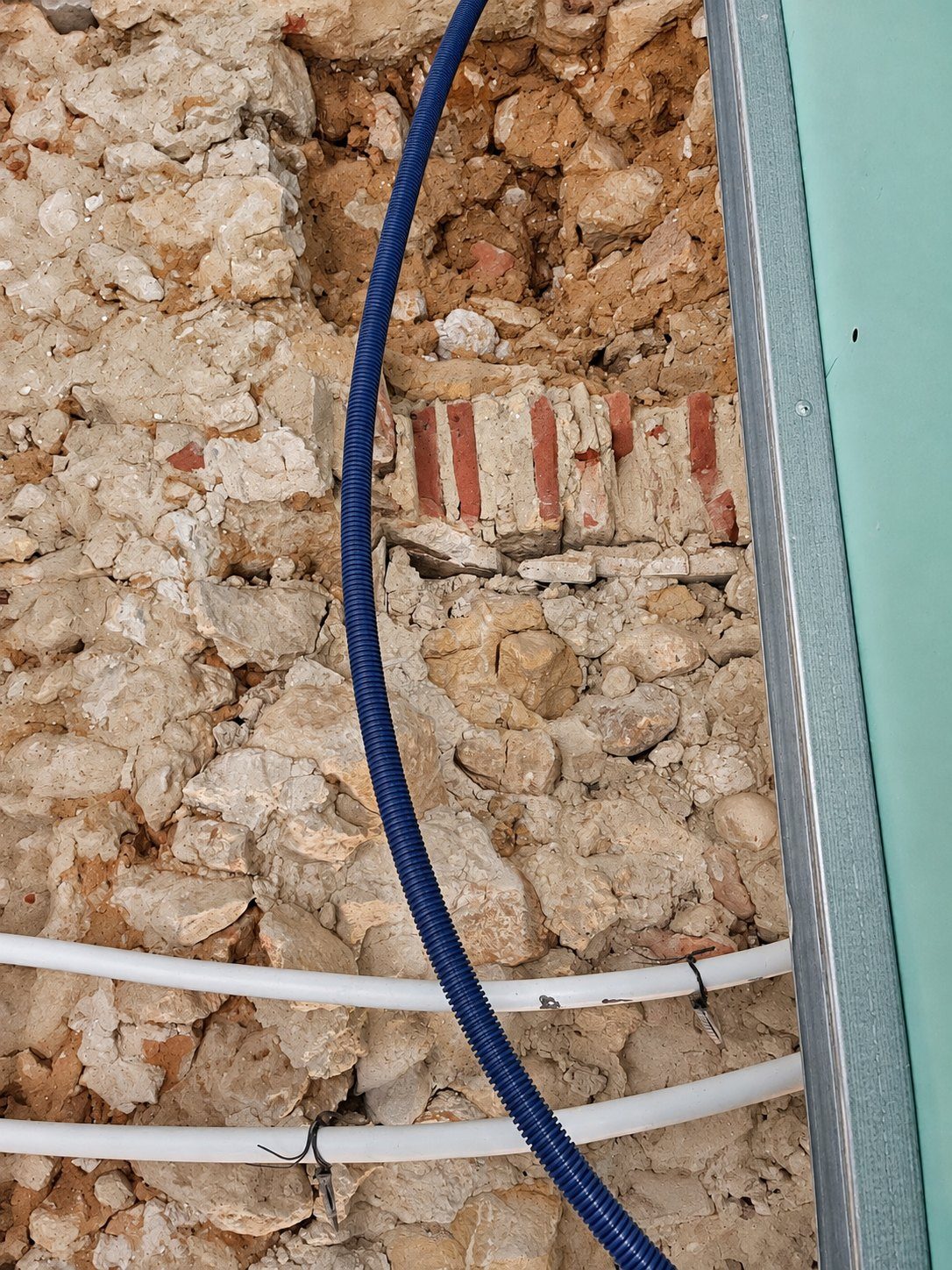 Stone masonry behind the new lining